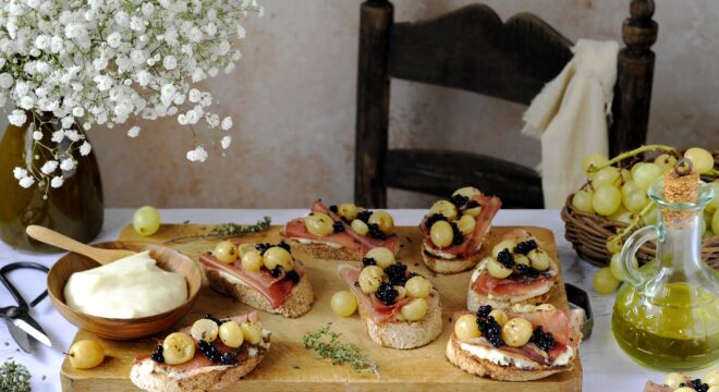 Crostini with Roasted Grapes, Cured Pork Loin